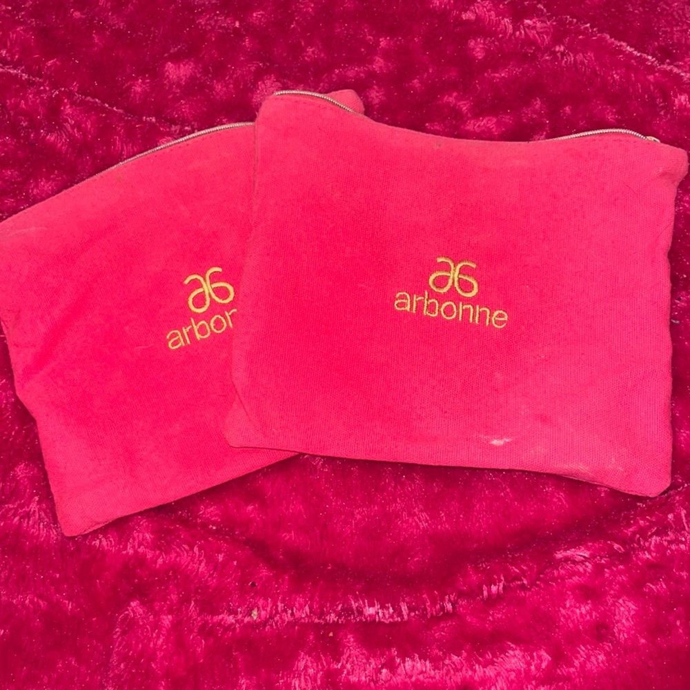 2 air borne makeup bags